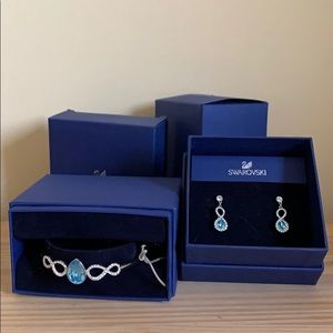 Swarovski earrings and a bangle